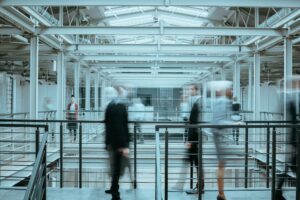 Blurred employees in company
